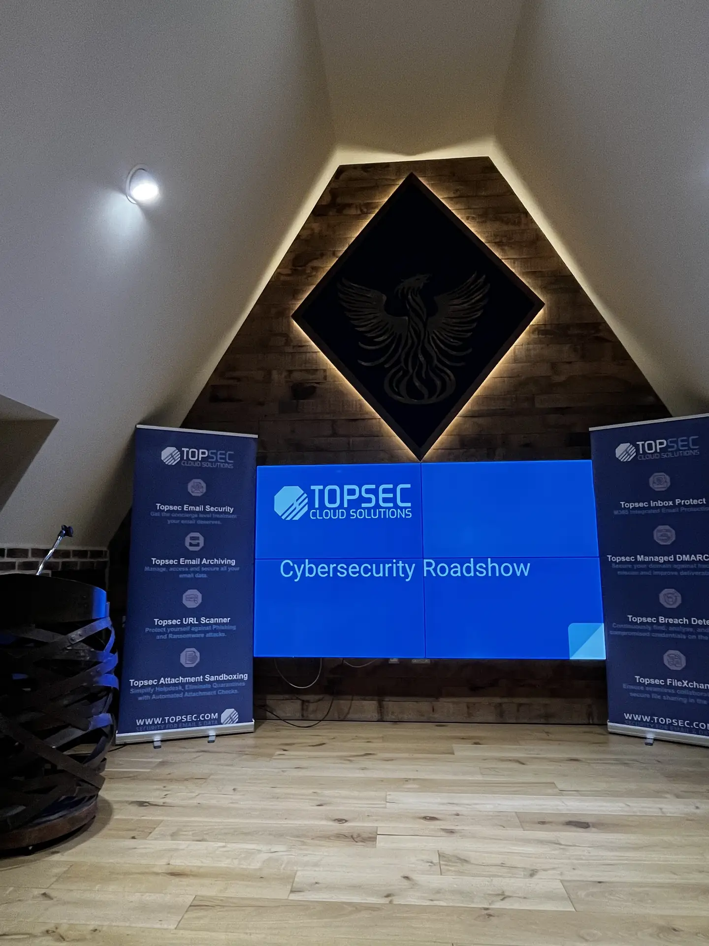 Topsec cybersecurity roadshow presentation on tv screen